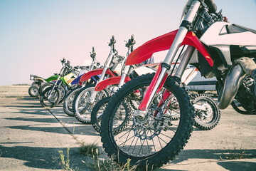 Motocross bike stand in a row