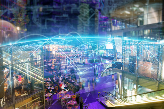 Aerial shot of a large metropolitan city where you can see graphics that connect all the people of the world thanks to the internet. Concept of: speed, future, connection.