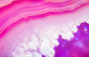 small white quartz crystals in bright pink agate