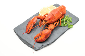 freshly boiled lobster on slate plate