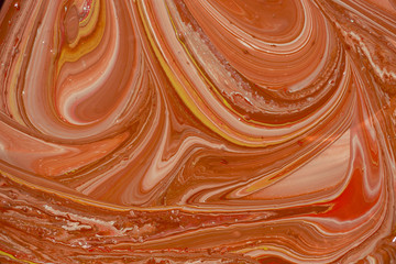 Photos of manufacturing a paint composite color. Mixing acrylic paint in different colors. Marbleized.