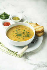 Pea and lentil soup with chili oil