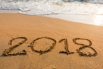 abstract  2018 on a beach sand