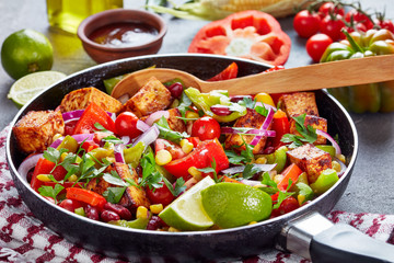 Warm black bean and corn salsa with tofu close up