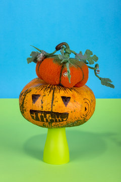 Still life with handmade pumpkins from felted wool for the celebration of Halloween