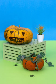Still life with handmade pumpkins from felted wool for the celebration of Halloween