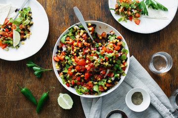 Top view Dinner table Taco salad wooden table