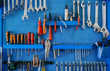 Background with set of tools organized on a tool board - obrazy, fototapety, plakaty