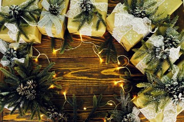 rustic styled new year , vintage style wooden texture background. Happy New Year 2019 greetings on wooden. Empty space for your text. Christmas background with decorations, xmas tree and gift