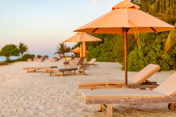 Perfect tranquil beach scene, soft sunlight and white sand and blue endless sea as tropical landscape