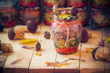 Autumn harvest mushrooms marinated vegetables jars