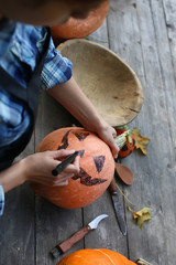 carve pumpkins for Halloween
