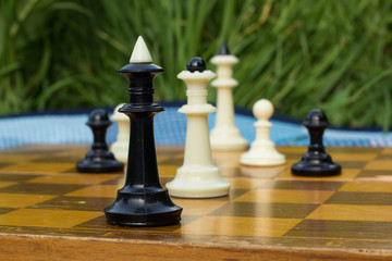 soft focus chess black and white figures in game time position 