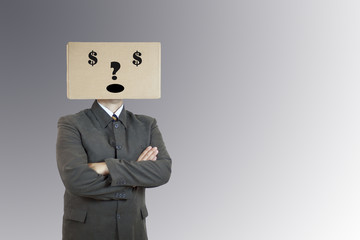 man standing and gesturing with a cardboard box on his head with dollar signs