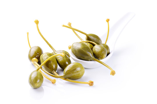 Caper fruits on white background