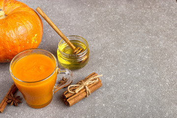 Pumpkin smoothie for Thanksgiving, autumn drink. Copy space.