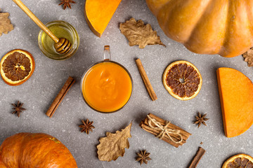 Pumpkin smoothie for Thanksgiving, autumn drink. Top view.