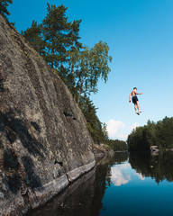 Cliff jumping in Finland lake