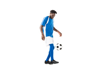 side view of african american sportsman playing with soccer ball isolated on white
