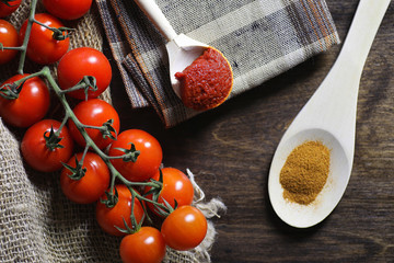 Branch with fresh cherry tomatoes. Ripe red tomatoes. Tomatoes a