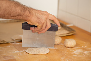 Men making dough