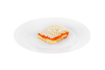 Mimosa salad layered, with potatoes, carrots, eggs, fish, grated on plate, white isolated background Side view. For the menu, restaurant, bar cafe