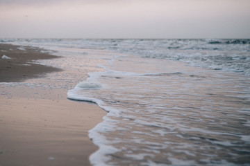 view of the sea, coastline, summer landscape in evening, sunset
