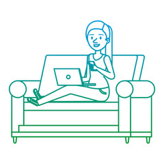 young woman at sofa with laptop and smartphone