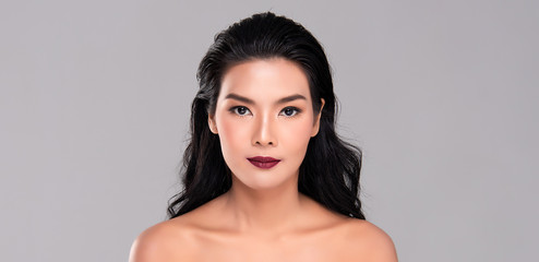 Naklejka premium Young asian woman with clean skin of the face