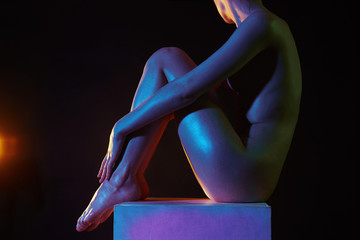 Nude Woman in Colorful bright lights