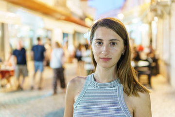Happy Young Woman Portrait Having Fun In The City At Night