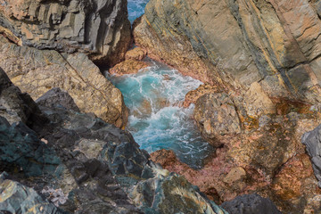View from inside a Cueva de Ajuy and rock formation and below a puddle of water in Fuerteventura, Canary Islands, Spain