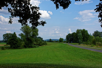 on the road with clouds