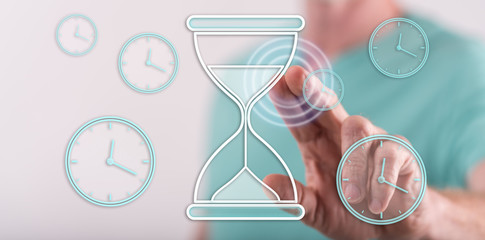 Man touching a time management concept