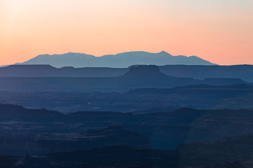 Naklejka na ściany i meble Last Light Of A Sunset Over Many Layers Of Canyons In Moab Utah