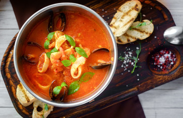tomato soup with seafood, cacciucco, top view