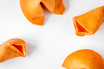 Chinese fortune cookie with prediction on white background top v