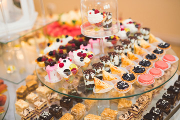Different kinds of baked sweets on a buffet