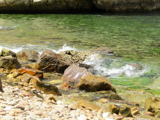 Jebha island and waves and rocks
