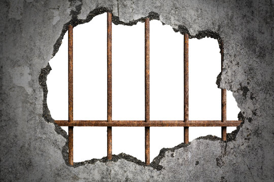 Broken old grunge wall with old prison rusted metal bars on white with clipping path, concept of escape