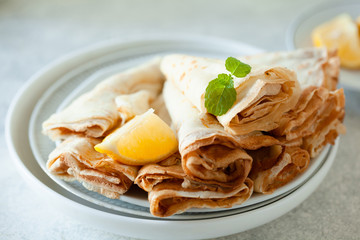 Lemon crepes on the plate