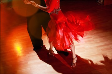 Man and a woman dancing Salsa