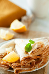 Lemon crepes on the plate