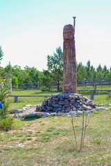 Old wooden statue of the ancient pagan God