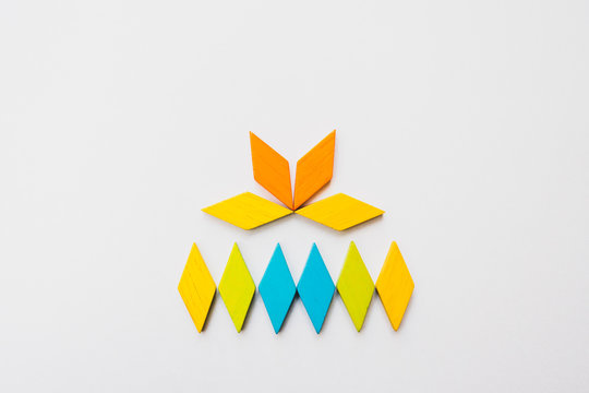 Tangram puzzle flower shape use for education and creative concept