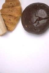 Three kind of bread on a white isolated background
