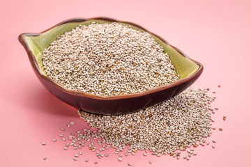 white chia seeds in a leaf bowl