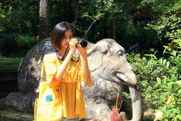 woman traveling to Lam Kinh palace in Thanh Hoa, Vietnam