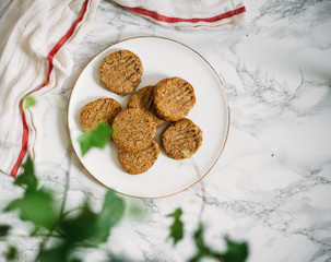 Gluten free cookie with buckwheat, corn and rice flour on white marble background