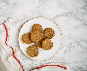 Gluten free cookie with buckwheat, corn and rice flour on white marble background